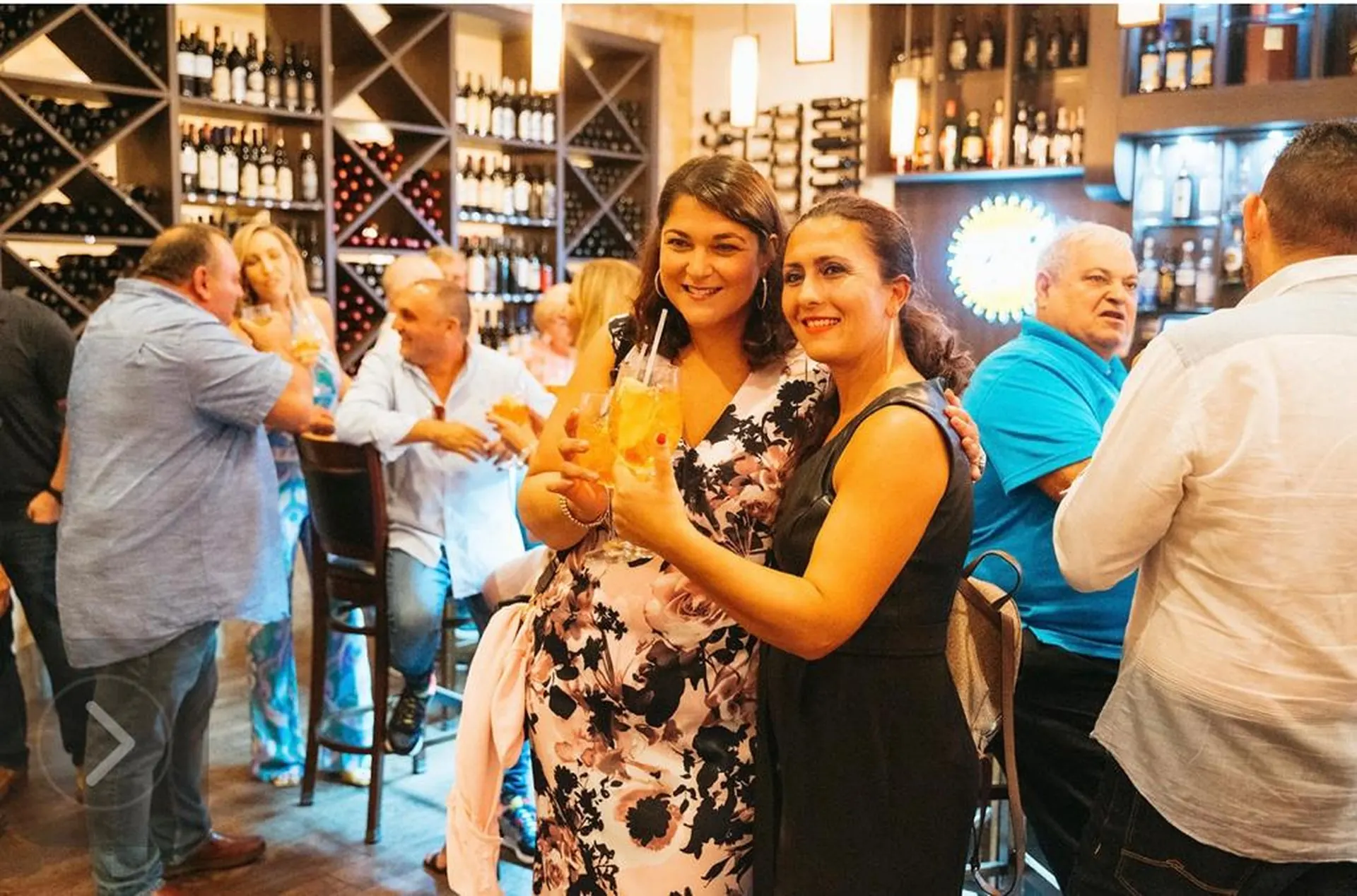 Guests enjoying drinks at Vincenzo bar