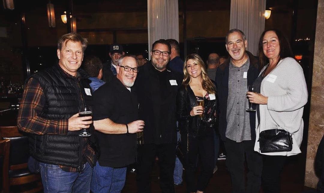 Group of coworkers enjoying after work happy hour at Vincenzo Orlando