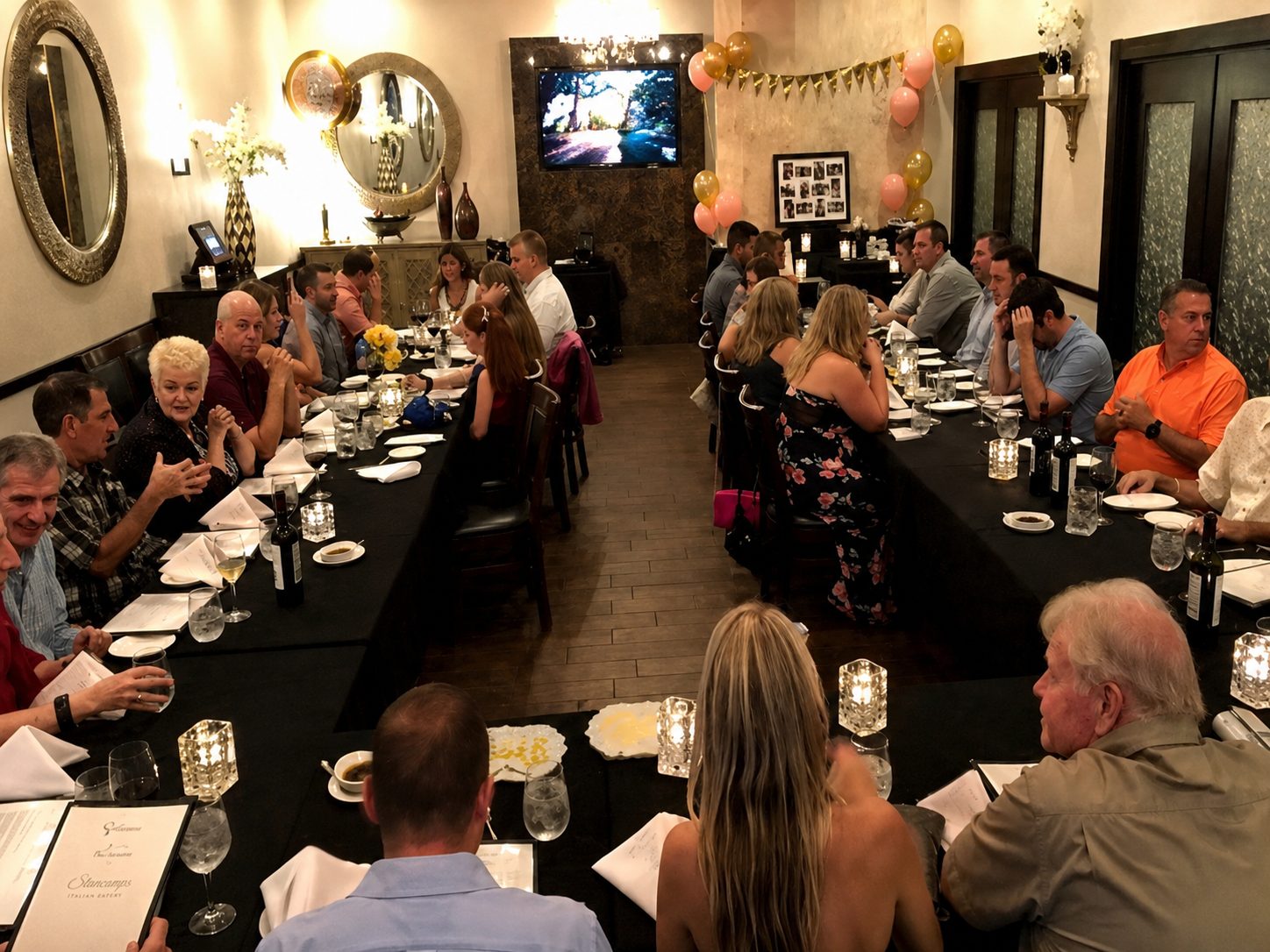 Big group enjoying dinner at Vincenzo