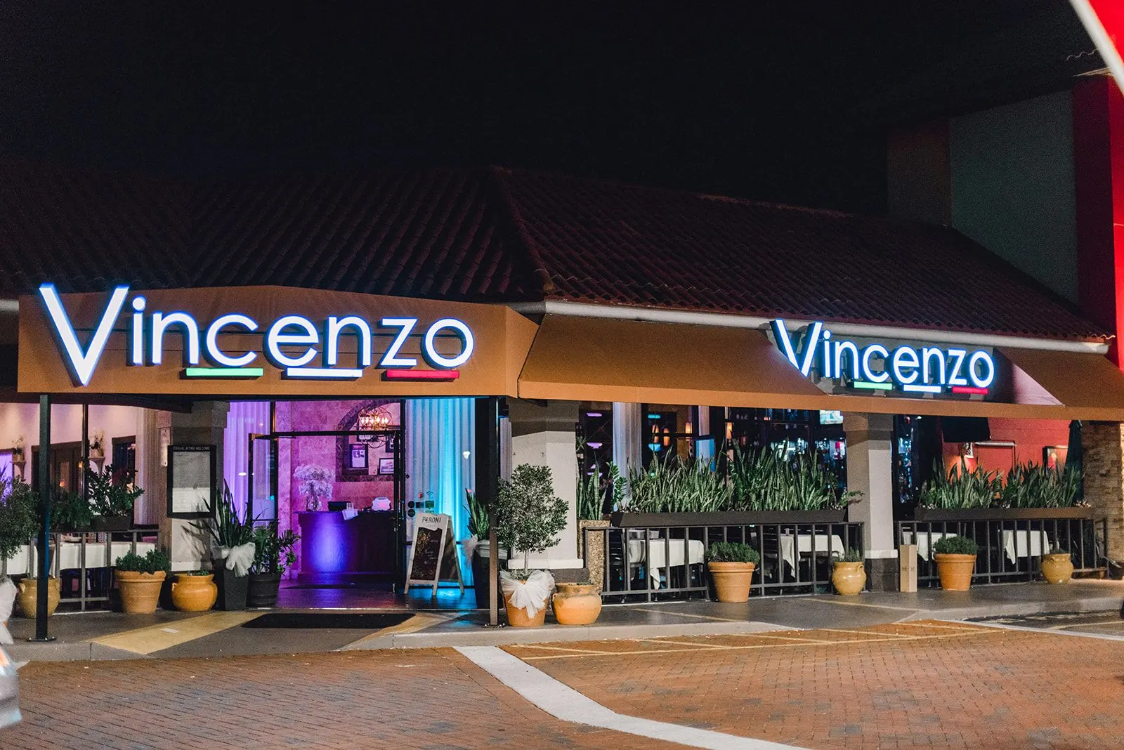 Vincenzo restaurant exterior at night on International Drive Orlando